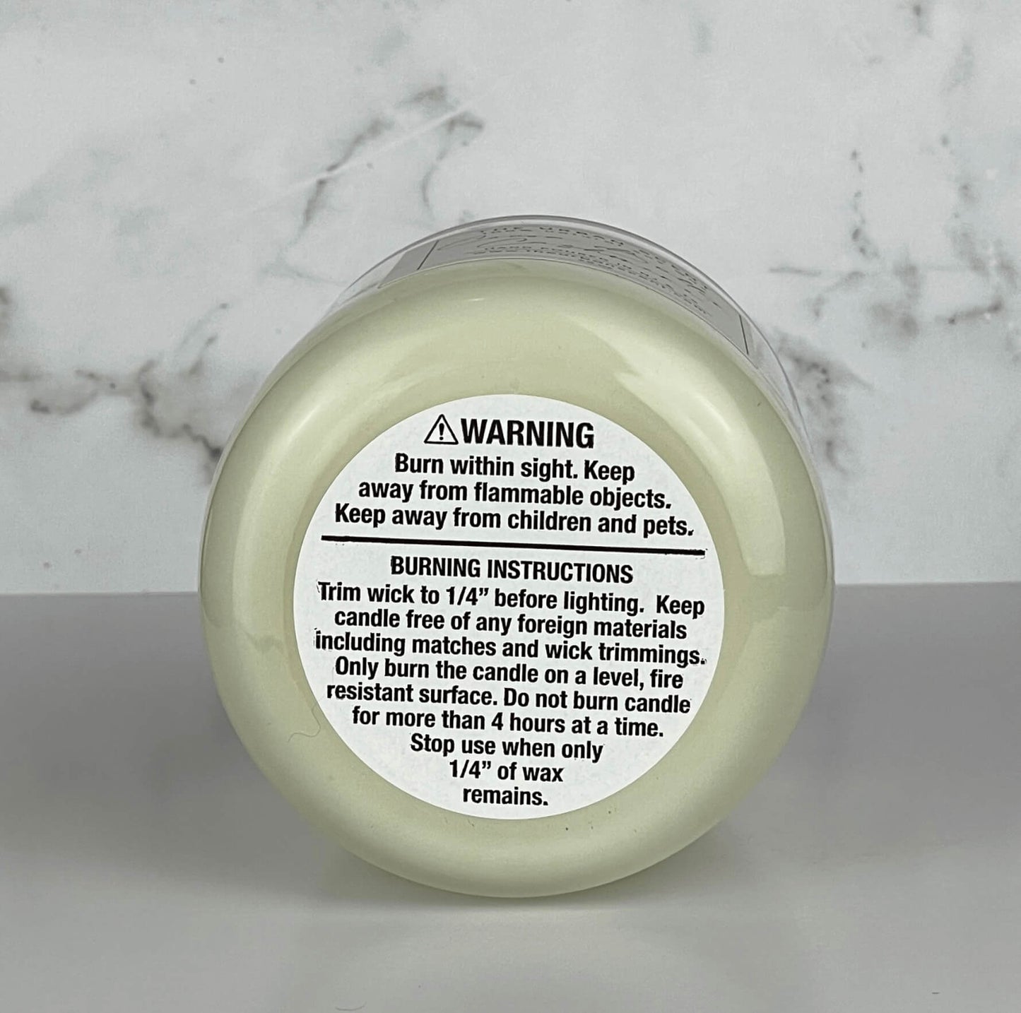 The Urban Scent scented soy wax candle, Candle warning and burning instruction label