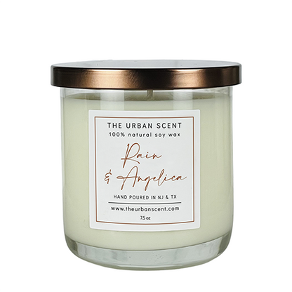 Rain & Angelica soy candle with citrus, floral, and warm amber notes in a minimalist jar.