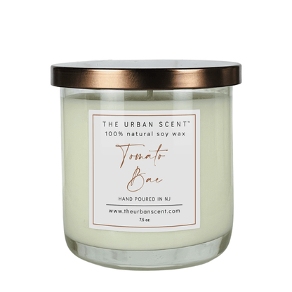 Tomato Bae scented candle by The Urban Scent in a minimalist glass jar featuring tomato leaf, basil, and lemon peel notes.