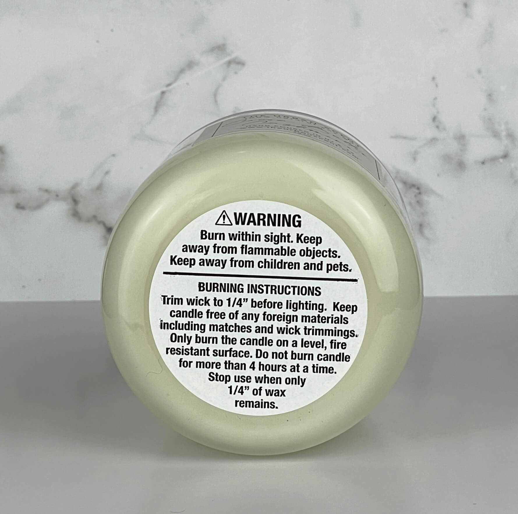 The Urban Scent scented soy wax candle, Candle warning and burning instruction label