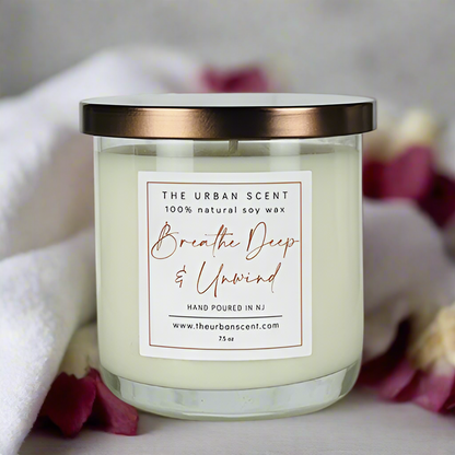 reathe Deep and Unwind soy candle burning — mint and eucalyptus scent for self-care, meditation and relaxation by The Urban Scent NJ