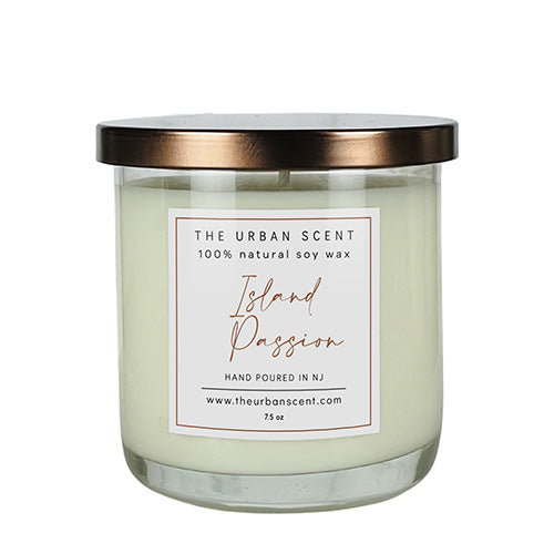 Island Passion soy candle with orange, apple, floral, and musk notes in a jar.